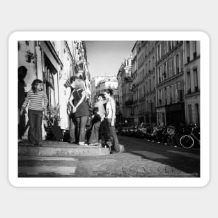 French street imagery group of young adults on Montmartre street corner outside pub Sticker